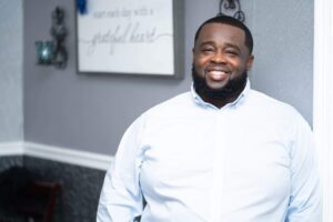 Professional headshot of Antonio Evans